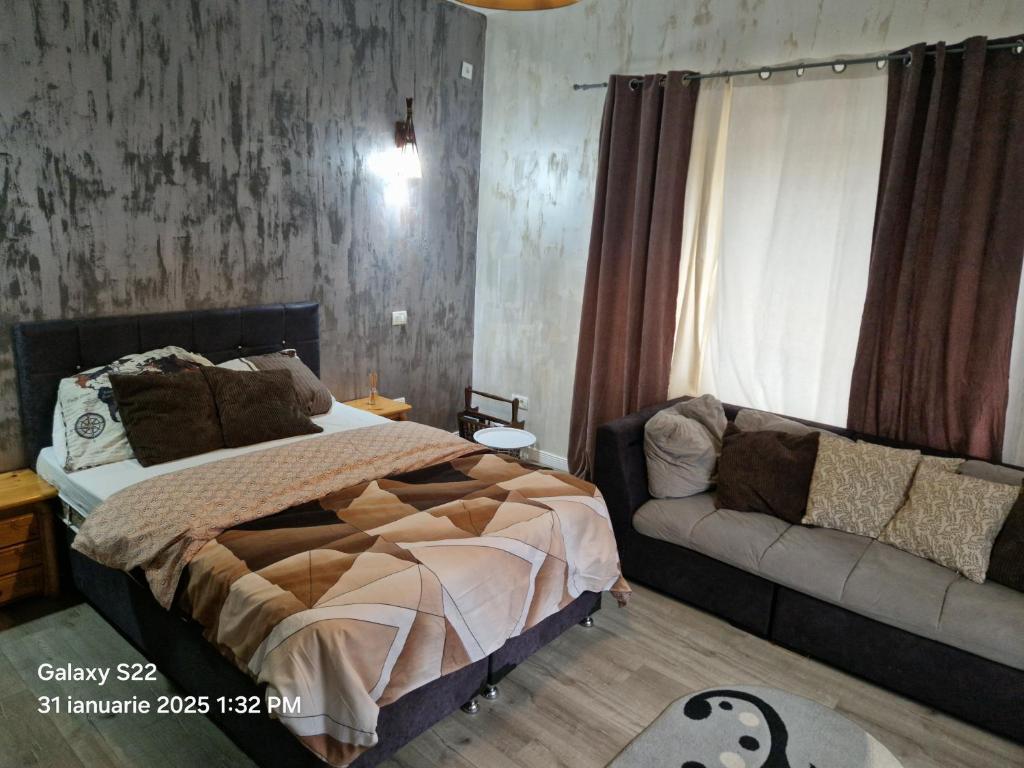 Ένα ή περισσότερα κρεβάτια σε δωμάτιο στο Casa Rahova