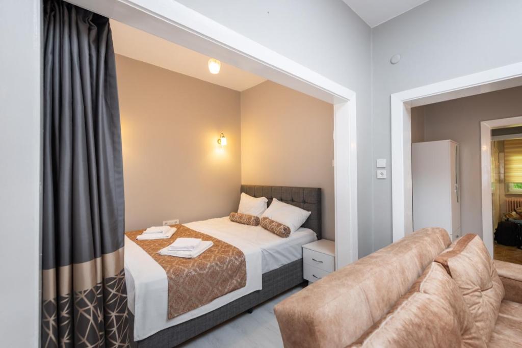 Postel nebo postele na pokoji v ubytování Galley Port Hotel