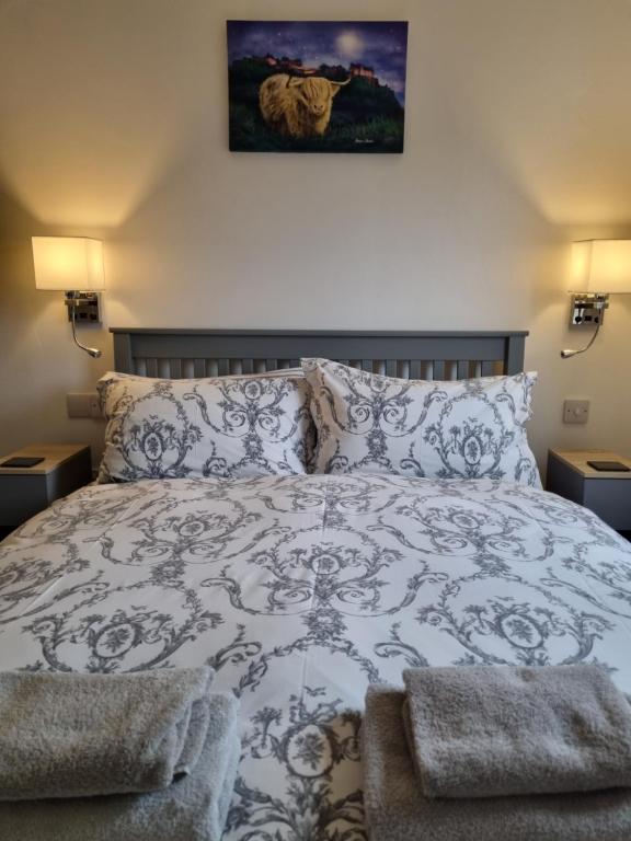 Postel nebo postele na pokoji v ubytování Cala Sith Guesthouse