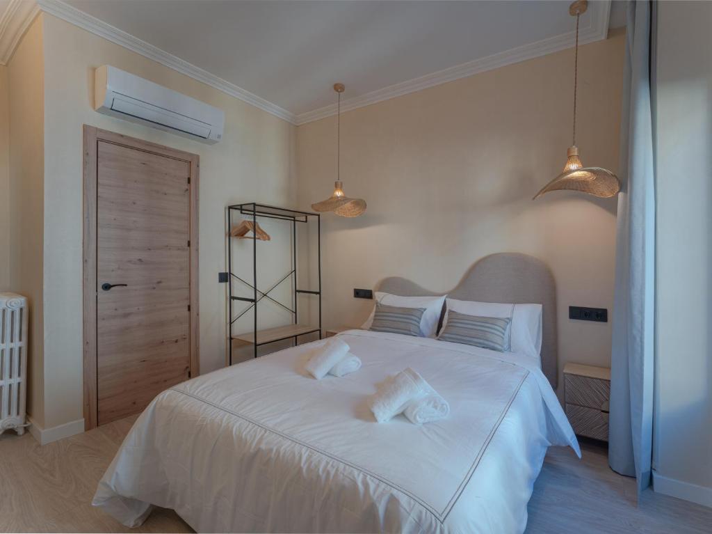 Postel nebo postele na pokoji v ubytování Das Carretas