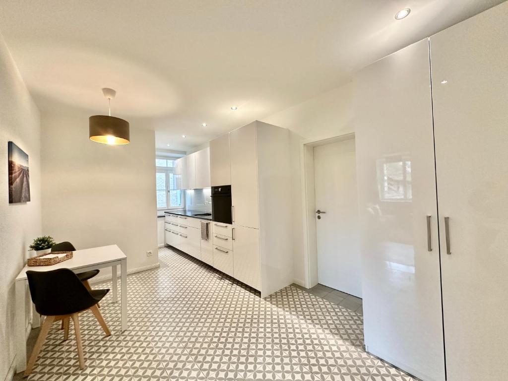 Kuchyň nebo kuchyňský kout v ubytování Business Apartment ZIMMERzuVERMIETEN in Solothurn