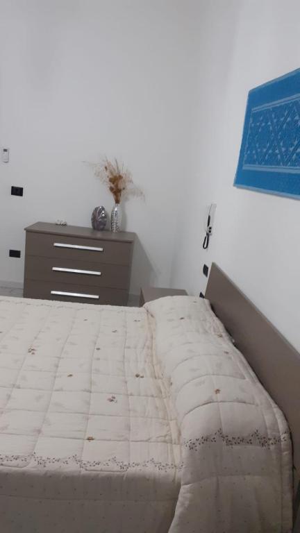 Łóżko lub łóżka w pokoju w obiekcie Cià Evelina