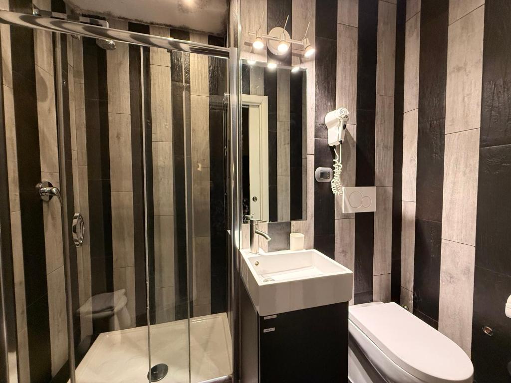 Koupelna v ubytování Hotel Felice
