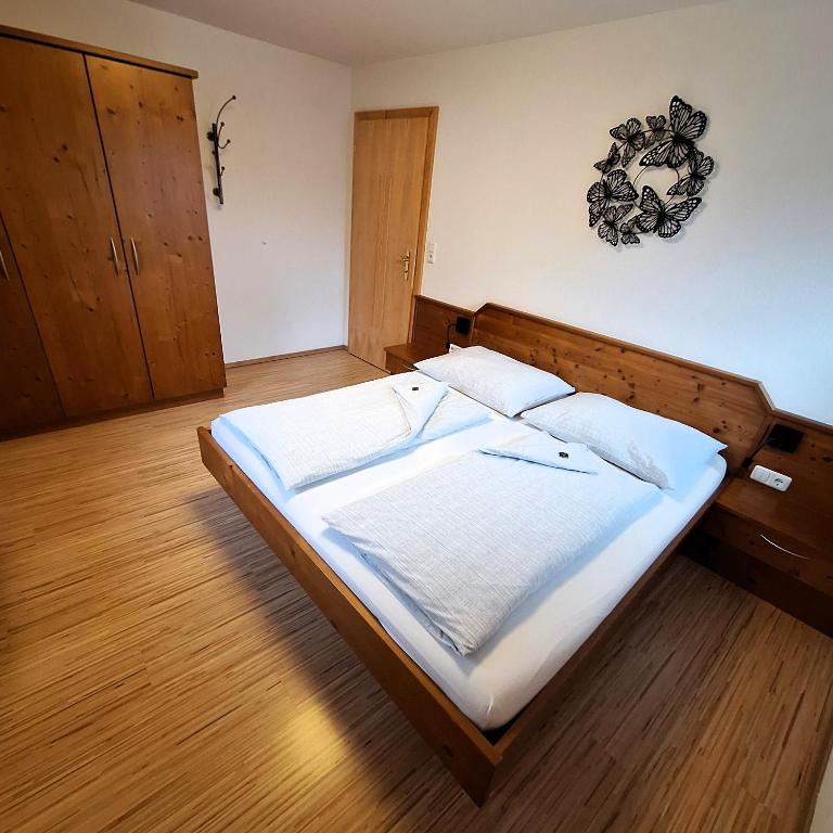 Postel nebo postele na pokoji v ubytování Baby- und Kinderbauernhof Riegler