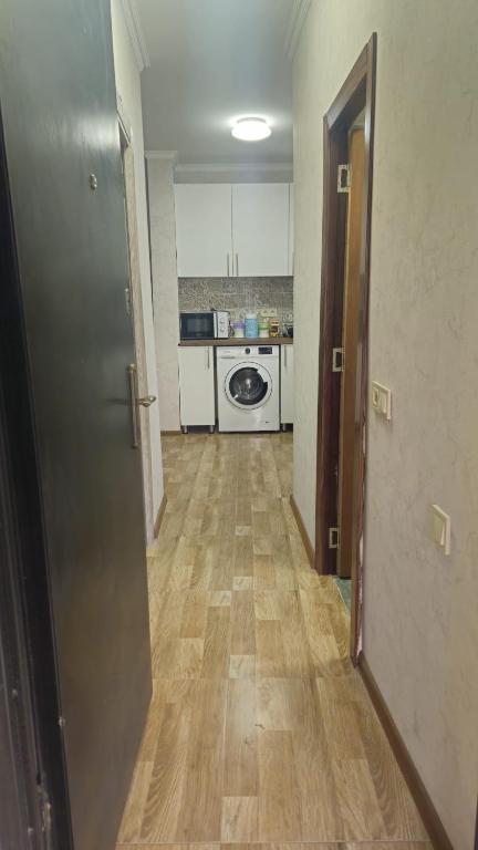 Kuchyň nebo kuchyňský kout v ubytování Apartment Oxalis