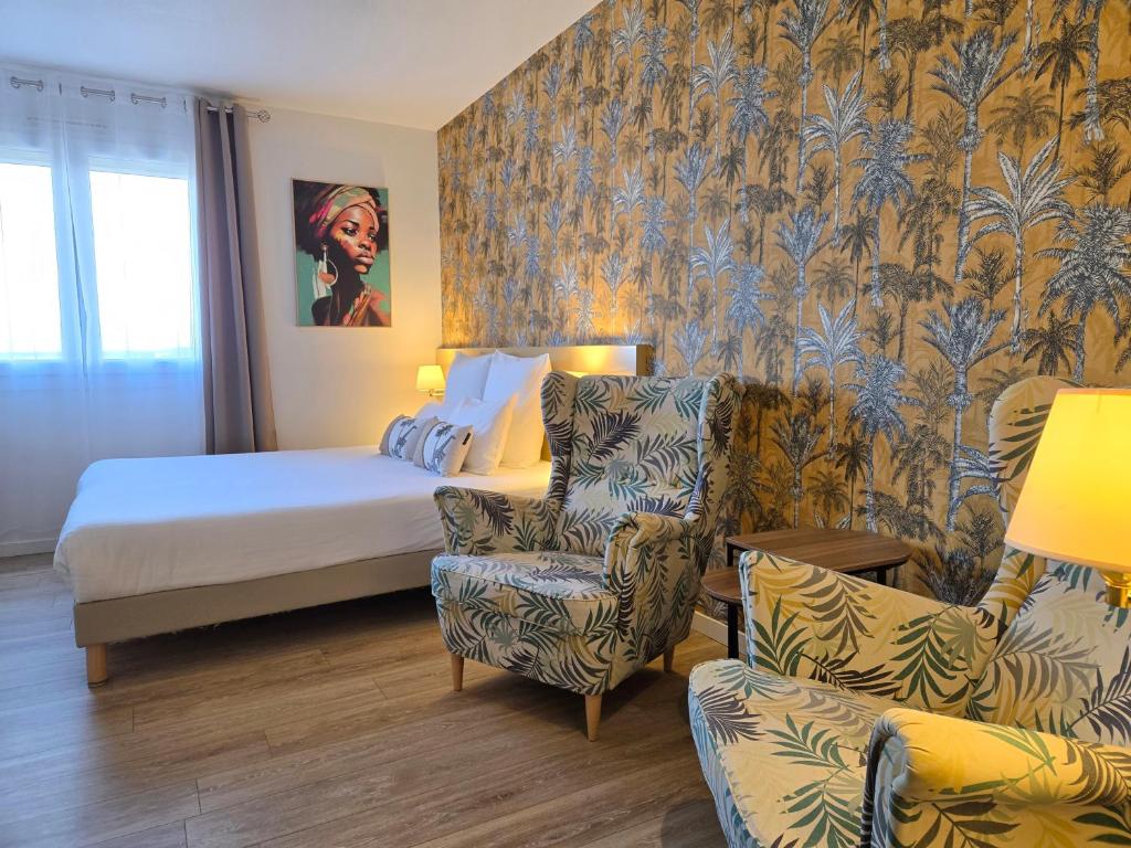 Postel nebo postele na pokoji v ubytování Hôtel Le SAINT-GENIÈS