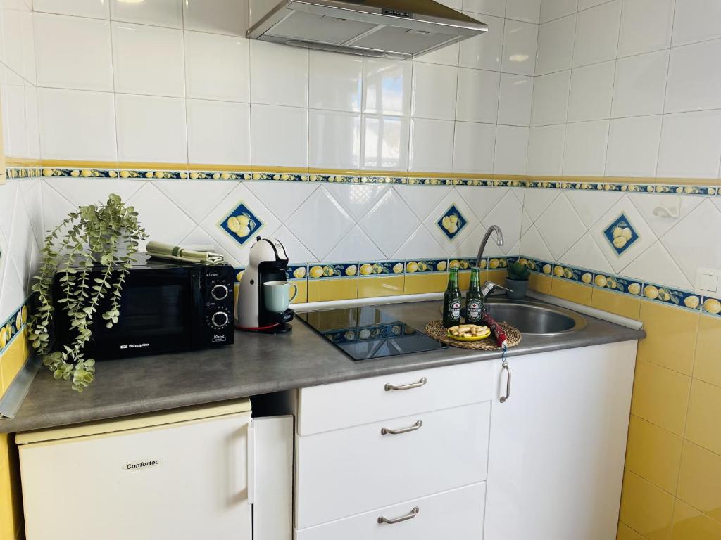 A kitchen or kitchenette at Estudio Jimena Córdoba en el centro de Nerja