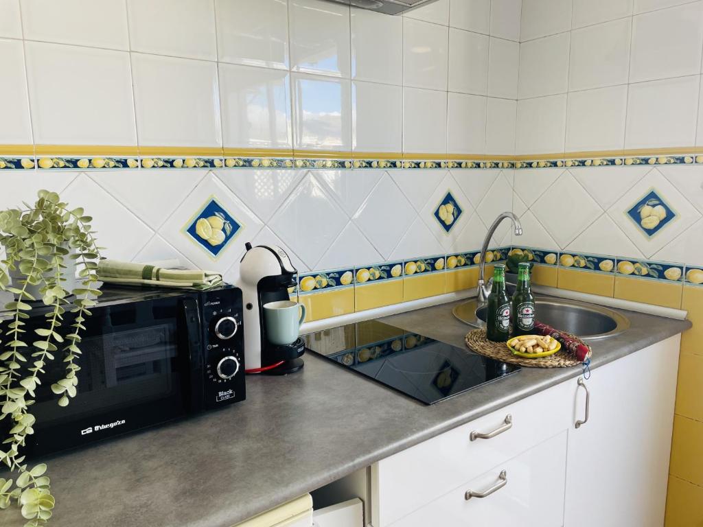 A kitchen or kitchenette at Estudio Jimena Córdoba en el centro de Nerja
