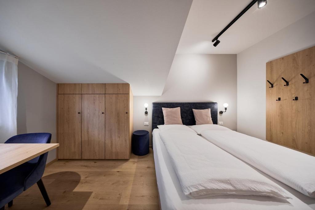 Łóżko lub łóżka w pokoju w obiekcie Apartment Steinach