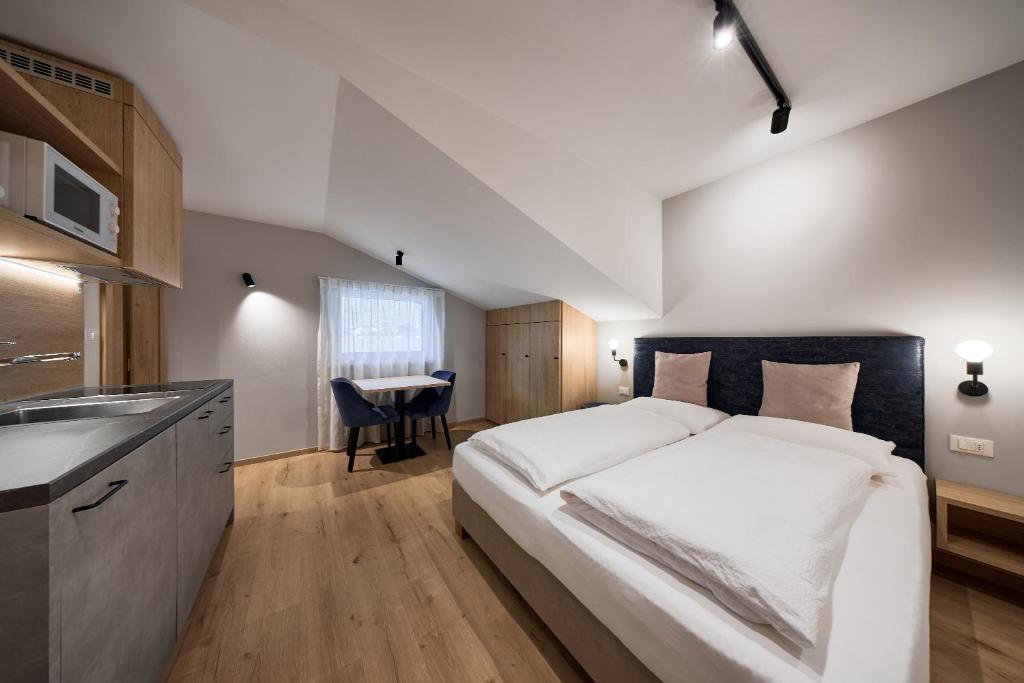 Łóżko lub łóżka w pokoju w obiekcie Apartment Steinach