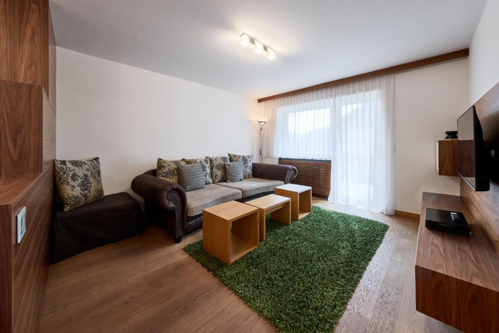 Telewizja i/lub zestaw kina domowego w obiekcie Apartment Steinach