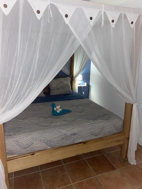 Postel nebo postele na pokoji v ubytování Colibri Villa Sainte Luce