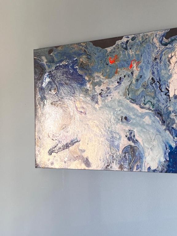 une peinture accrochée à un mur dans l'établissement Green sudr, à Ras Sudr