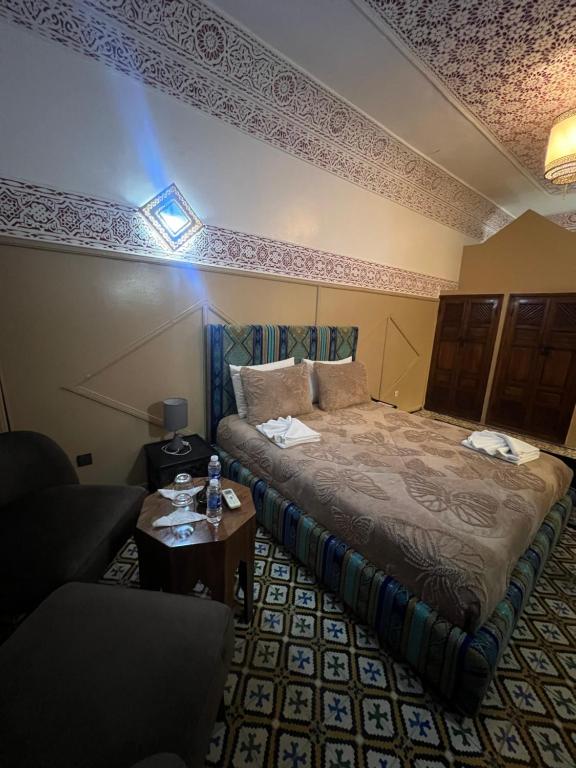 Postel nebo postele na pokoji v ubytování Riad La Perla Bianca