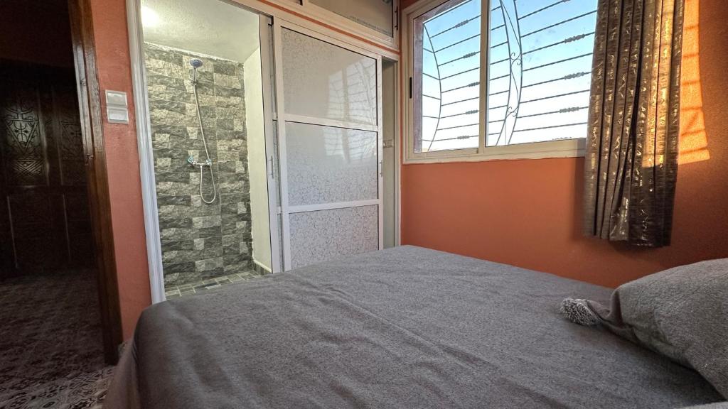 Postel nebo postele na pokoji v ubytování imiwadar home