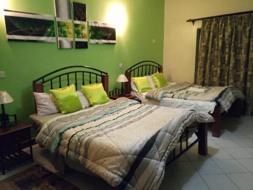 Postel nebo postele na pokoji v ubytování Inka homes