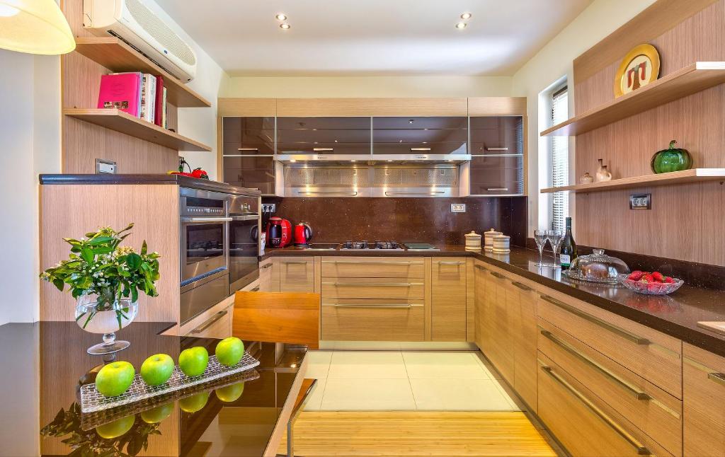 A kitchen or kitchenette at Villa Anastasia - Private Pool & Panoramic Views
