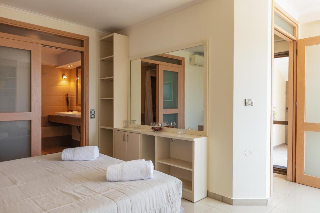 A bed or beds in a room at Villa Anastasia - Private Pool & Panoramic Views