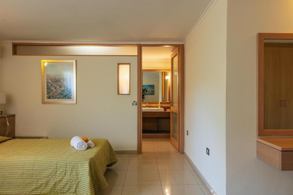 A bed or beds in a room at Villa Anastasia - Private Pool & Panoramic Views