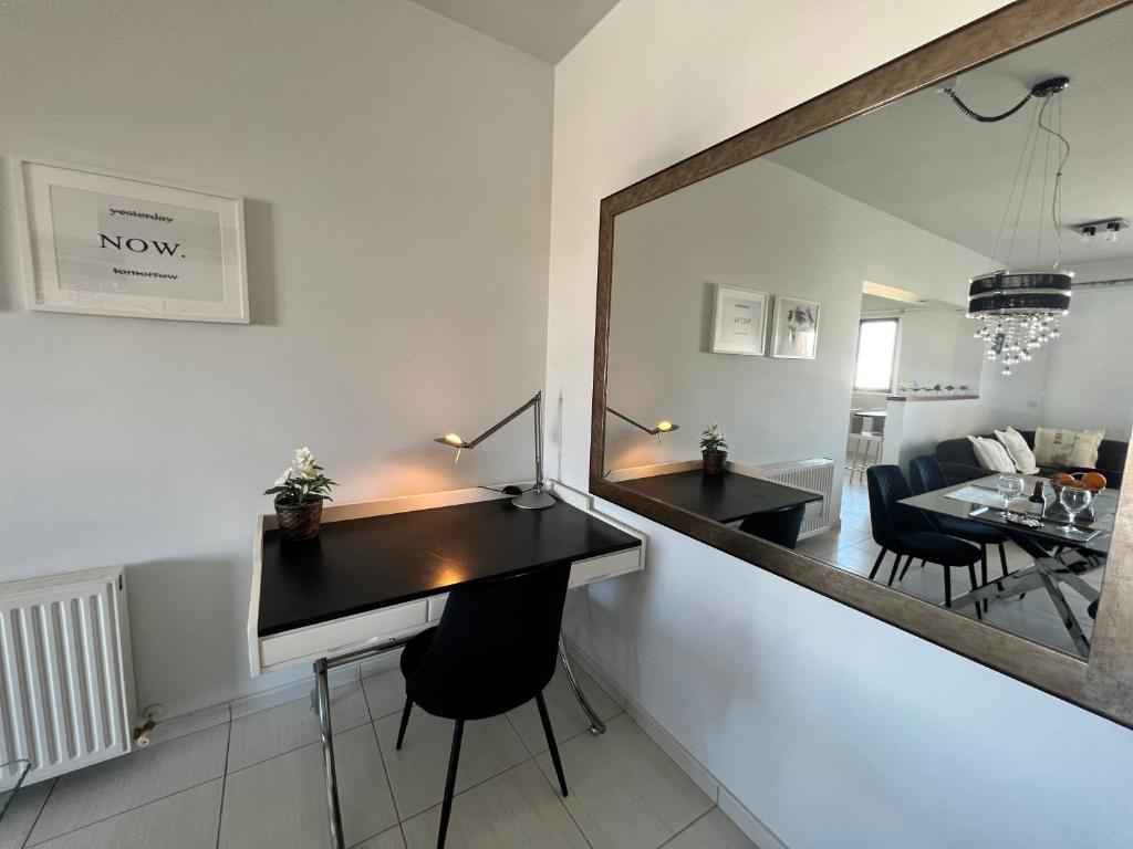 Posezení v ubytování Queens Boutique Apartment 2BR