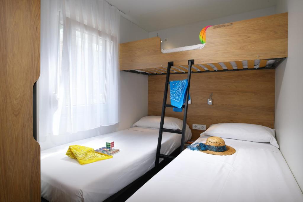 Postel nebo postele na pokoji v ubytování Isamar Holiday Village