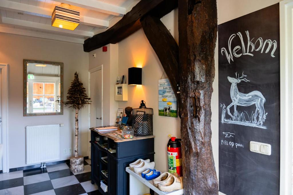 Kuchyň nebo kuchyňský kout v ubytování B&B Het Wellnest