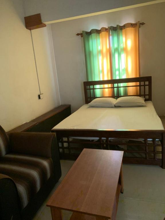 Postel nebo postele na pokoji v ubytování Hotel Change,Badulla