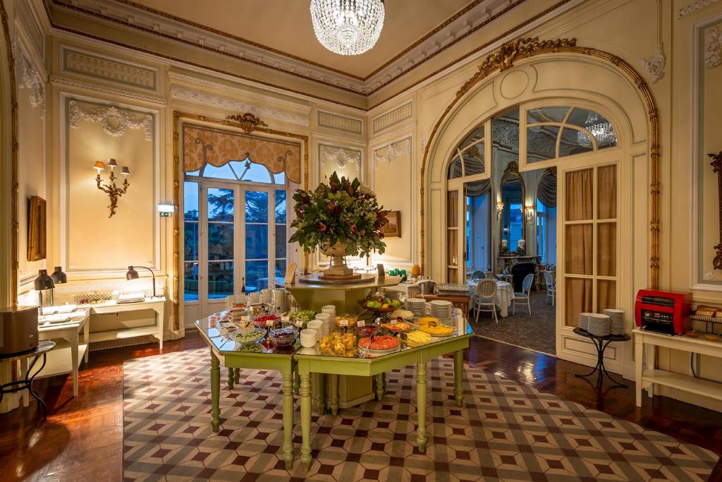 A palace room with a lavish breakfast buffet.