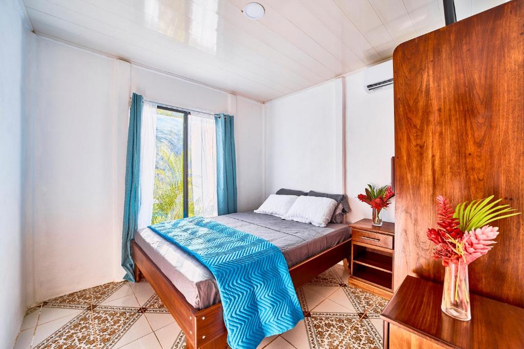 Postel nebo postele na pokoji v ubytování Villas Ande