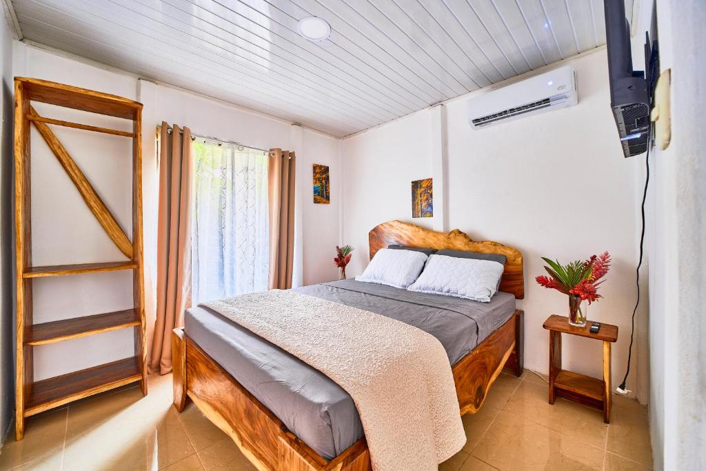 Postel nebo postele na pokoji v ubytování Villas Ande