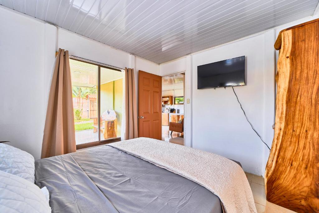 Postel nebo postele na pokoji v ubytování Villas Ande