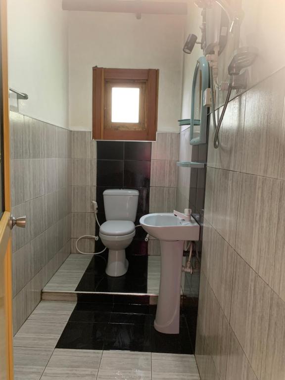 Koupelna v ubytování Hotel Change,Badulla