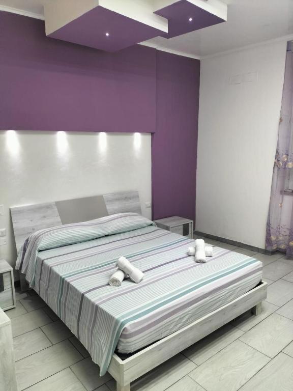 Postel nebo postele na pokoji v ubytování CASA DAVID