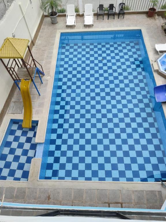 Bazén v ubytování Hotel South Beach Atacames nebo v jeho okolí