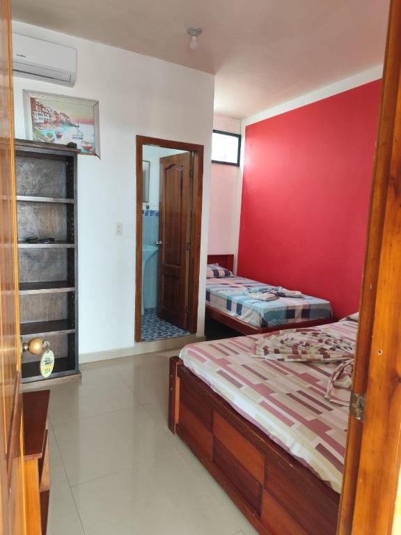 Postel nebo postele na pokoji v ubytování Hotel South Beach Atacames