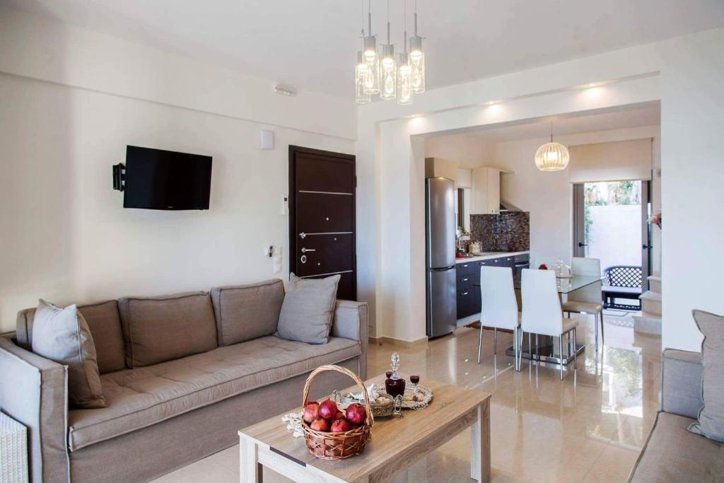 A television and/or entertainment centre at Villa Maria PF