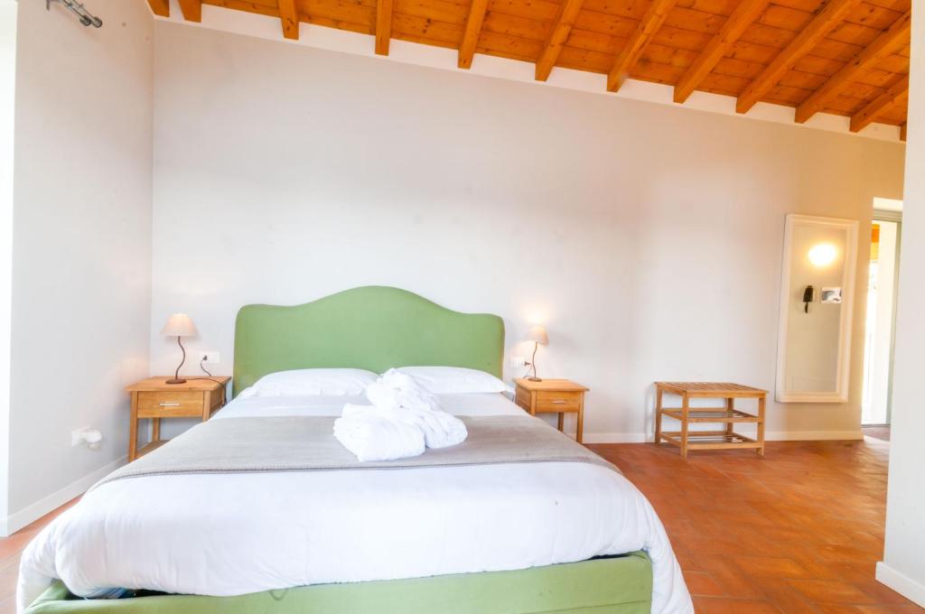 Postel nebo postele na pokoji v ubytování Locanda Pozzetto