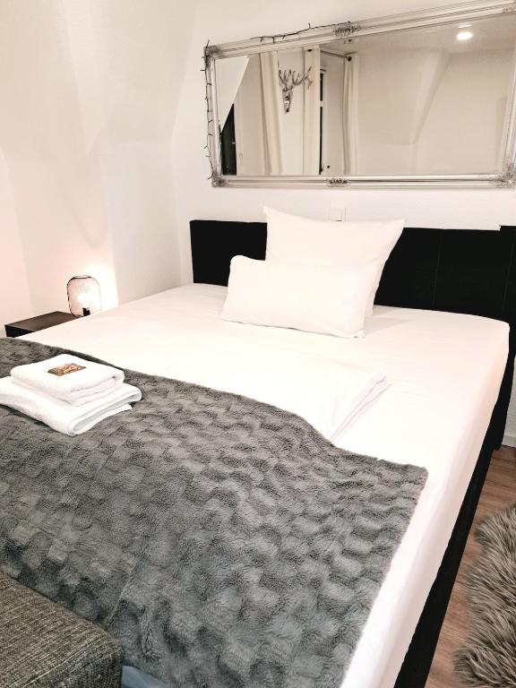 Ένα ή περισσότερα κρεβάτια σε δωμάτιο στο Enjoy Dresden Appartement
