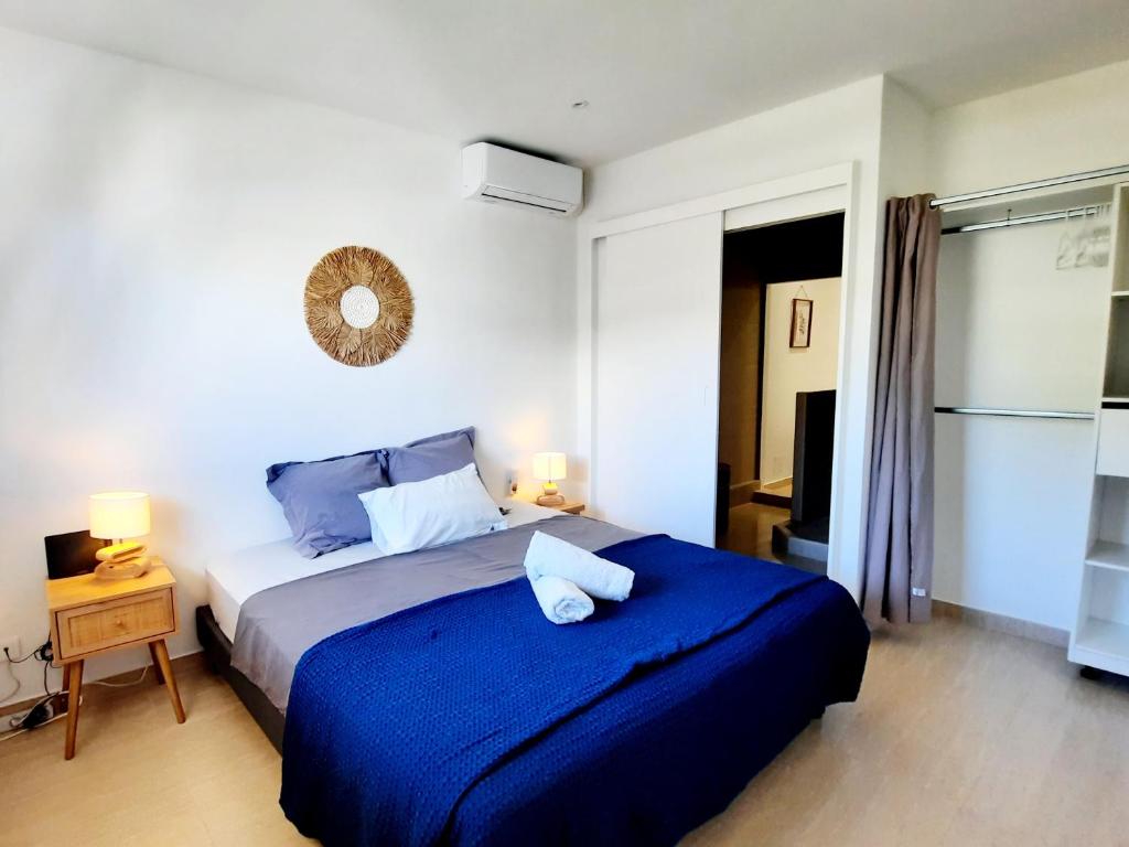 Postel nebo postele na pokoji v ubytování Superbe 2 chambres avec piscine