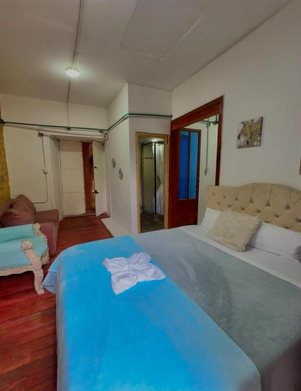 Postel nebo postele na pokoji v ubytování Casa Cordoba