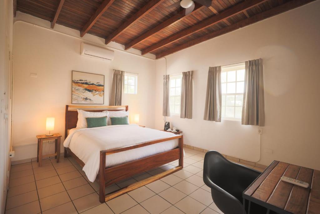 Postel nebo postele na pokoji v ubytování Alma Vida Hotel