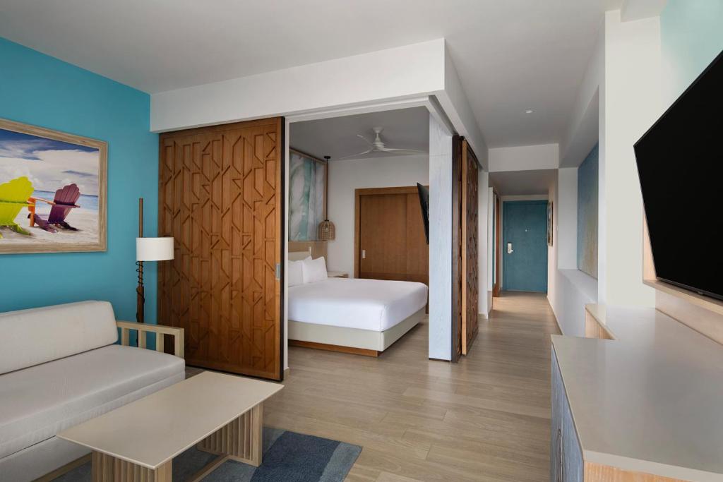 Letto o letti in una camera di Dreams Cap Cana Resort & Spa