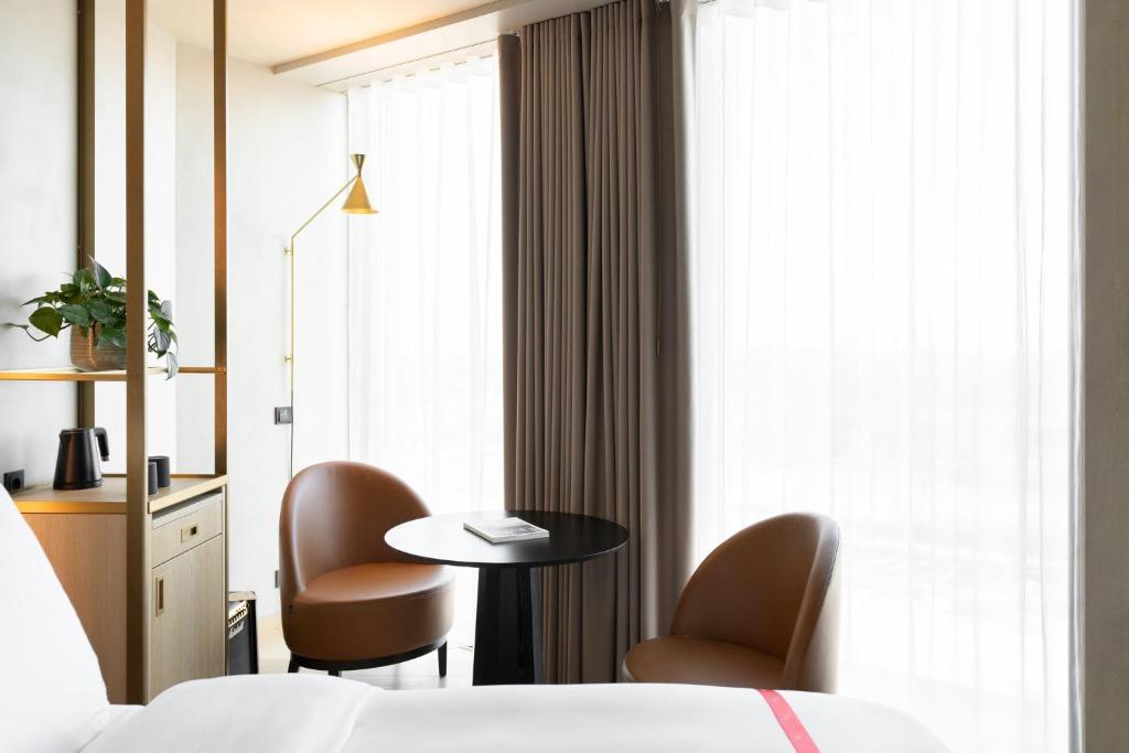Ένα ή περισσότερα κρεβάτια σε δωμάτιο στο Ruby Emma Hotel Amsterdam
