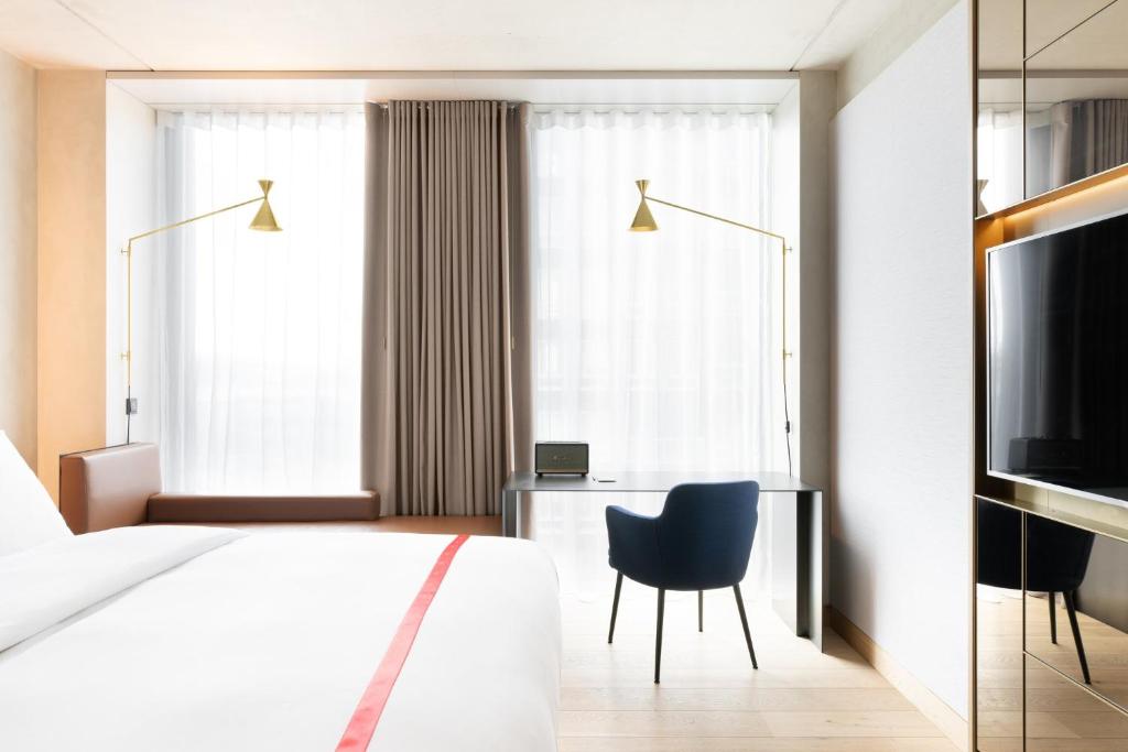 Ένα ή περισσότερα κρεβάτια σε δωμάτιο στο Ruby Emma Hotel Amsterdam