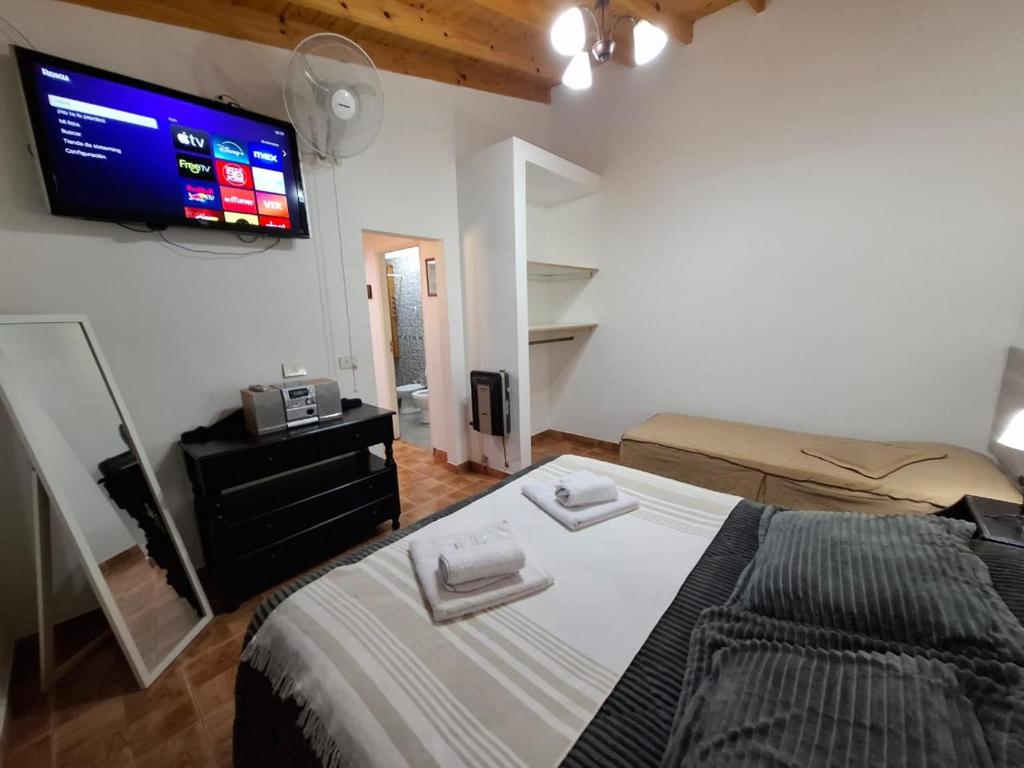 En eller flere senge i et værelse på MarinaBella Habitación 5