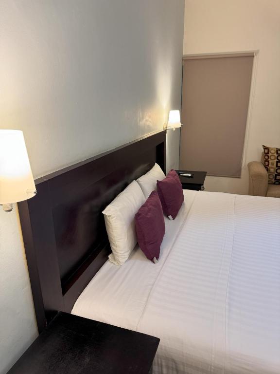 Postel nebo postele na pokoji v ubytování Hotel Arribo
