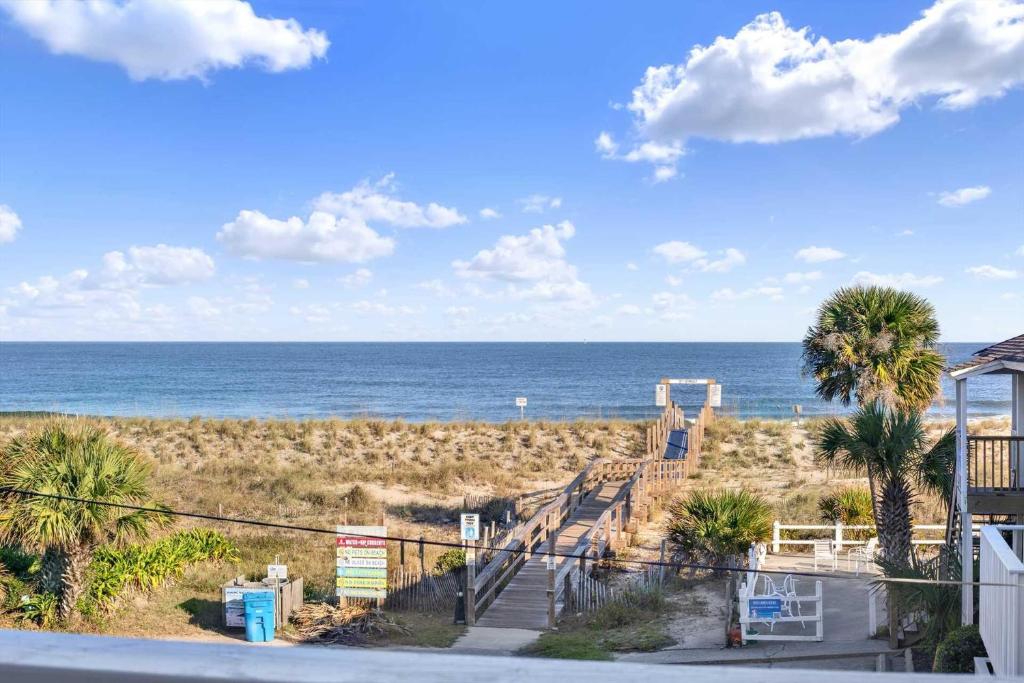 a view of the beach from the balcony of a house at Oceanview on Tybee 202-2 in Tybee Island