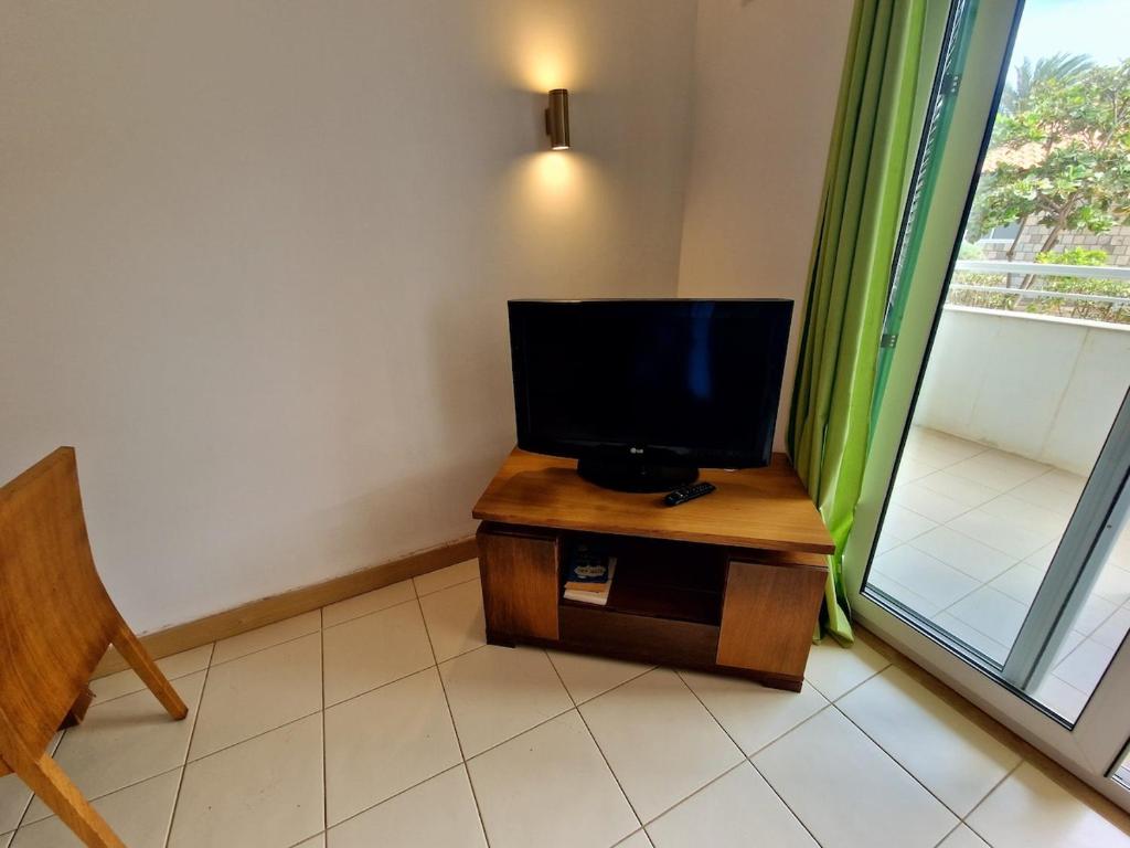 TV a/nebo společenská místnost v ubytování Stay, laugh, repeat!