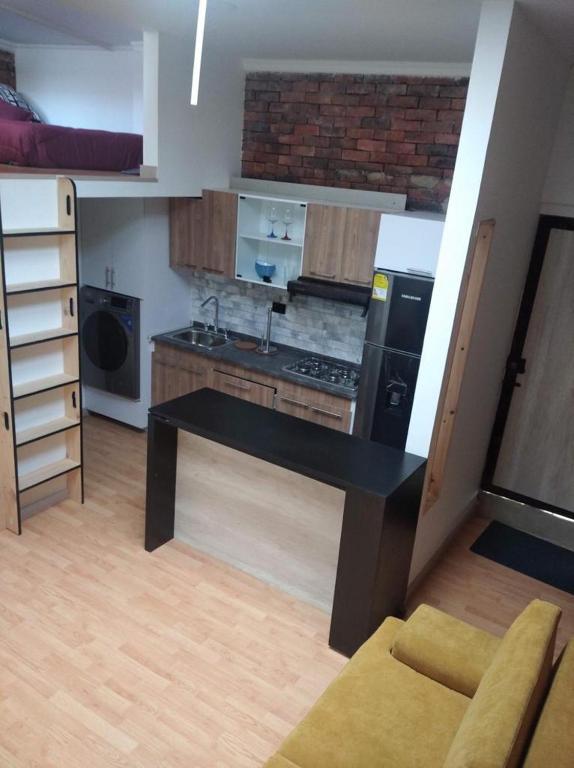 Kuchyň nebo kuchyňský kout v ubytování Hermoso Apartaestudio Todo Incluido Zona Céntrica