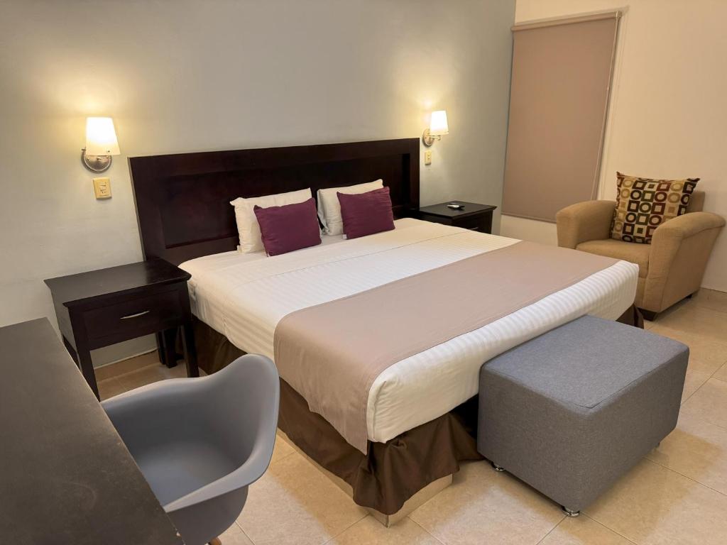 Postel nebo postele na pokoji v ubytování Hotel Arribo